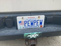 a license plate with the word pewpew on it